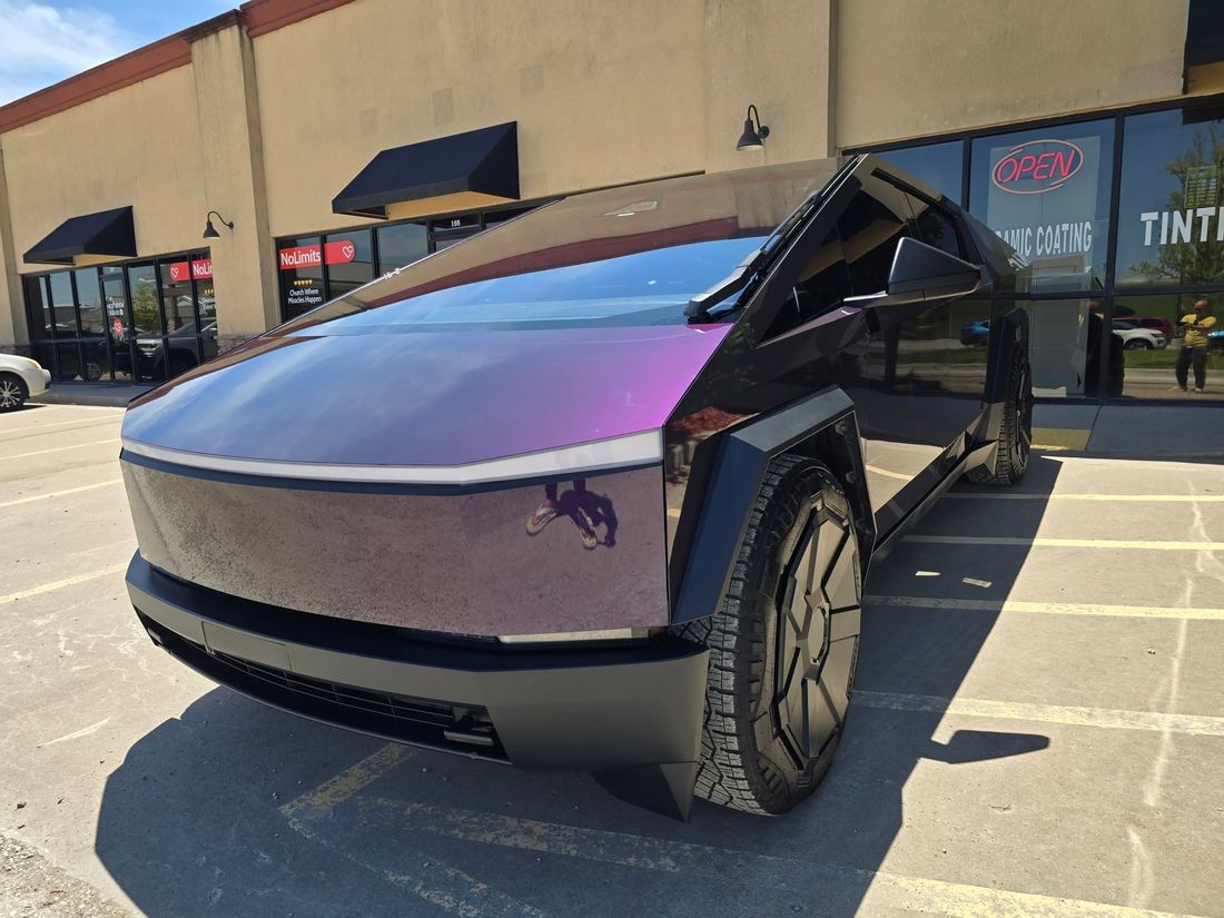 Tesla Cybertruck in a purple color-shift finish outside Auto Armor Owasso